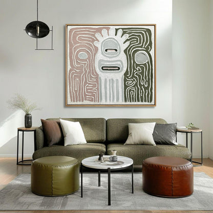 Abstract canvas featuring sage and rose tones over an olive green sofa in a relaxed, earthy-toned living space.