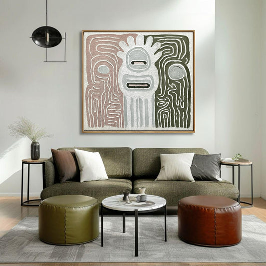 Abstract canvas featuring sage and rose tones over an olive green sofa in a relaxed, earthy-toned living space.