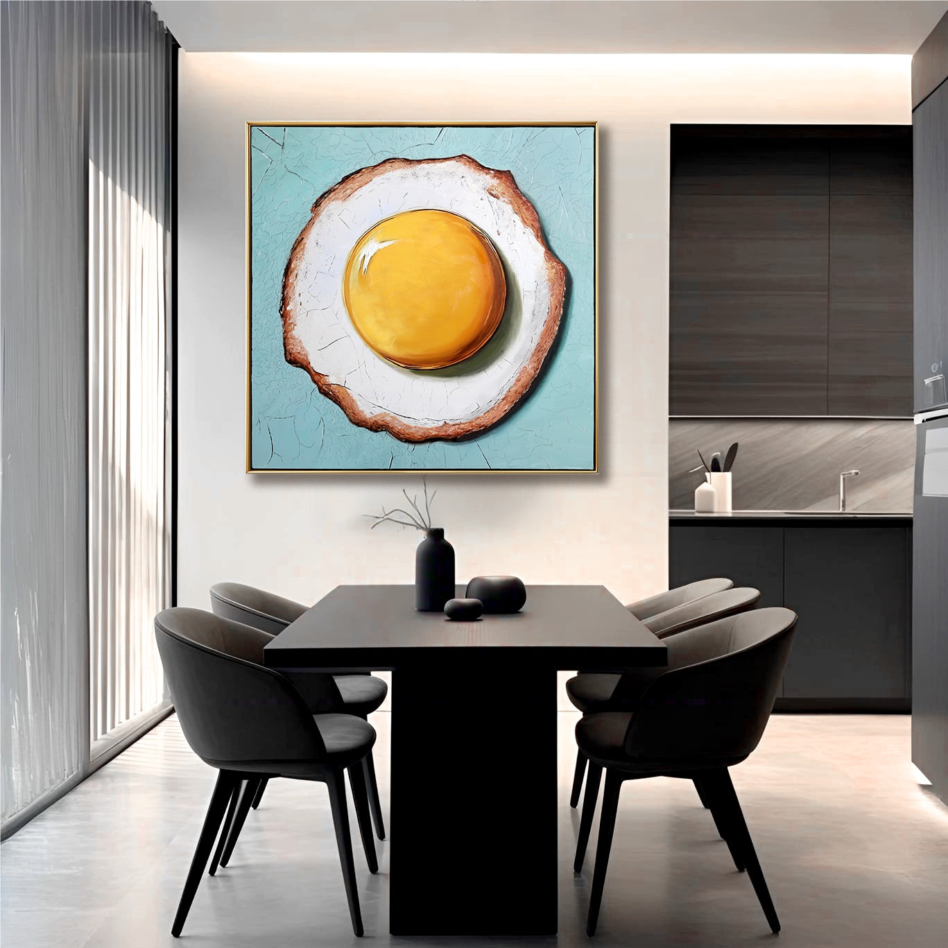 Large fried egg canvas in minimalist dark kitchen. Turquoise food art adds playful color to a sleek modern dining space.