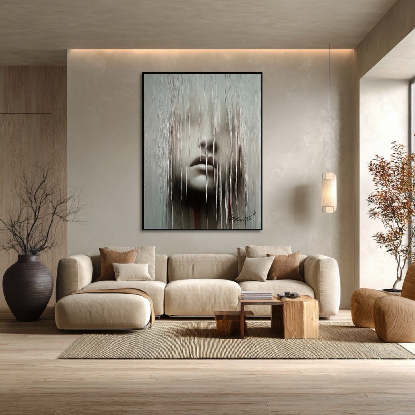 Modern living room with a beige sofa, abstract art on the wall, and decorative elements.