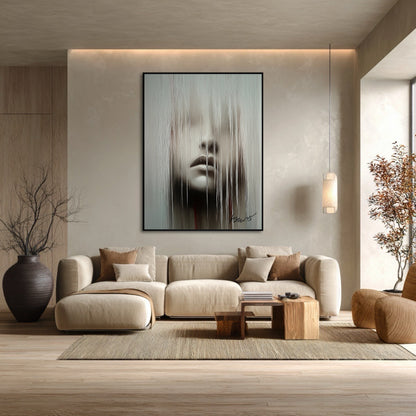 Modern living room with a beige sofa, abstract art on the wall, and decorative elements.