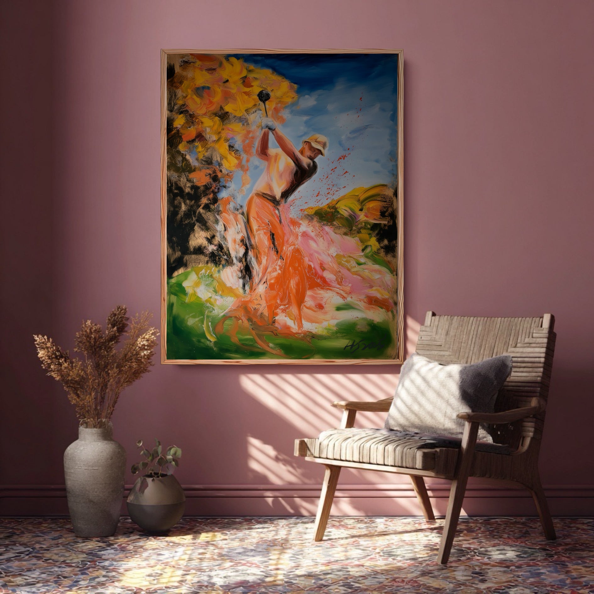 Hand-painted colorful golf art styled in a pink boho room. Dynamic warm tones create a bold contrast against the soft rose wall.