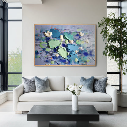 Statement abstract artwork elevates the bright, modern apartment with large windows, adding sophisticated color and depth.