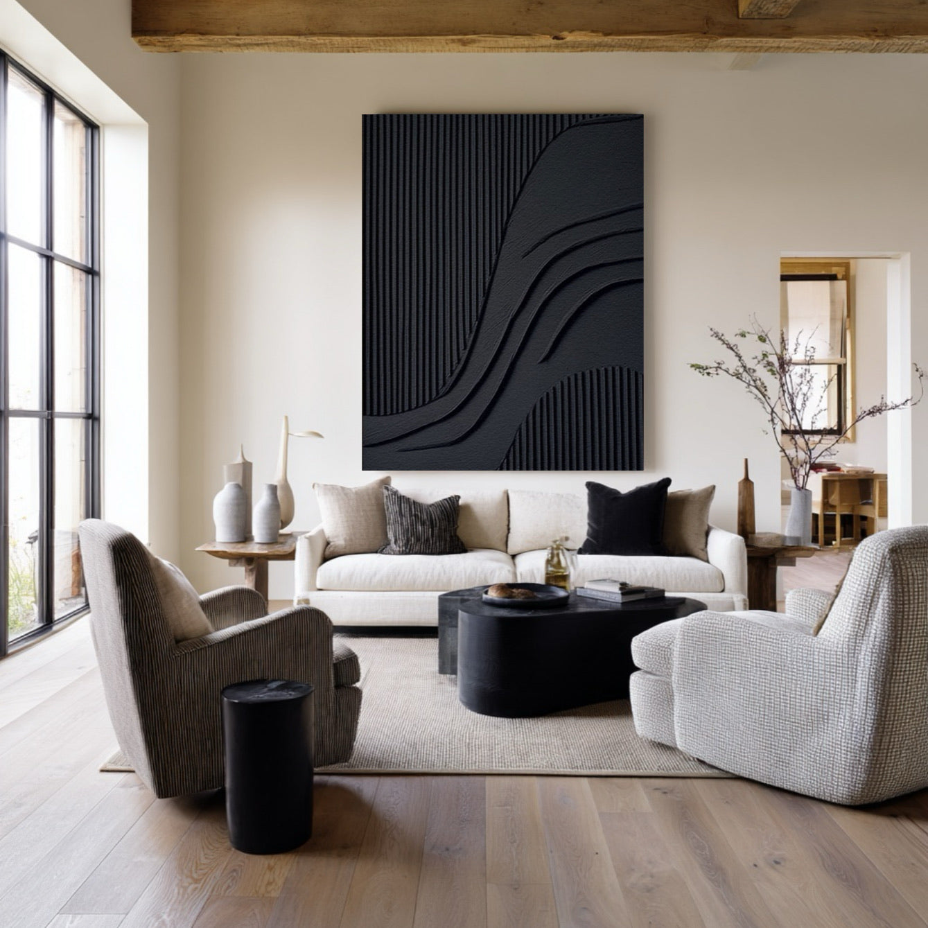 Original large art above light bench, adding a powerful contrast to a bright, clean interior with marble coffee table.