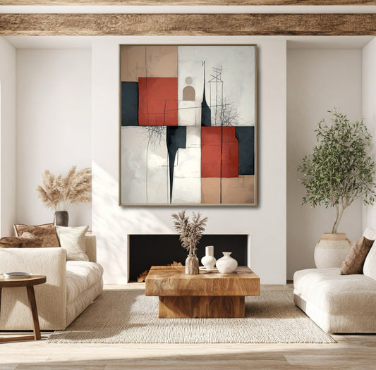 Red and black geometric art is centered over a modern fireplace, harmonizing with the natural wood beams, light linen sofas, and rustic textures.