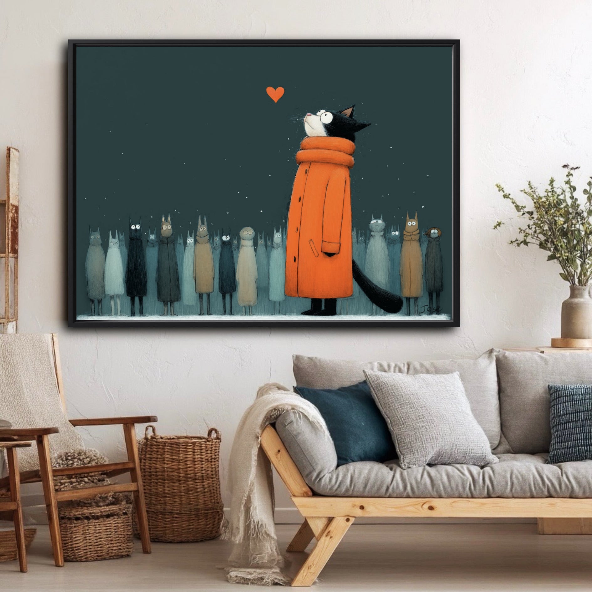 A large, framed painting of a cat provides a warm accent in a cozy, neutral-toned room above a light wood, Scandinavian-style sofa.