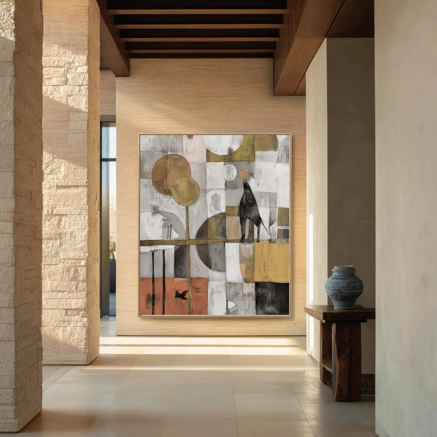 Original abstract painting brings warm color and character to the expansive, stone-columned hallway with natural light and wood beams.