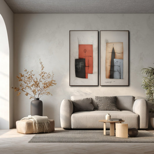 Abstract diptych grounds a minimalist seating area with a subtle archway, complementing the light gray sofa, dark vases, and muted earth tones.