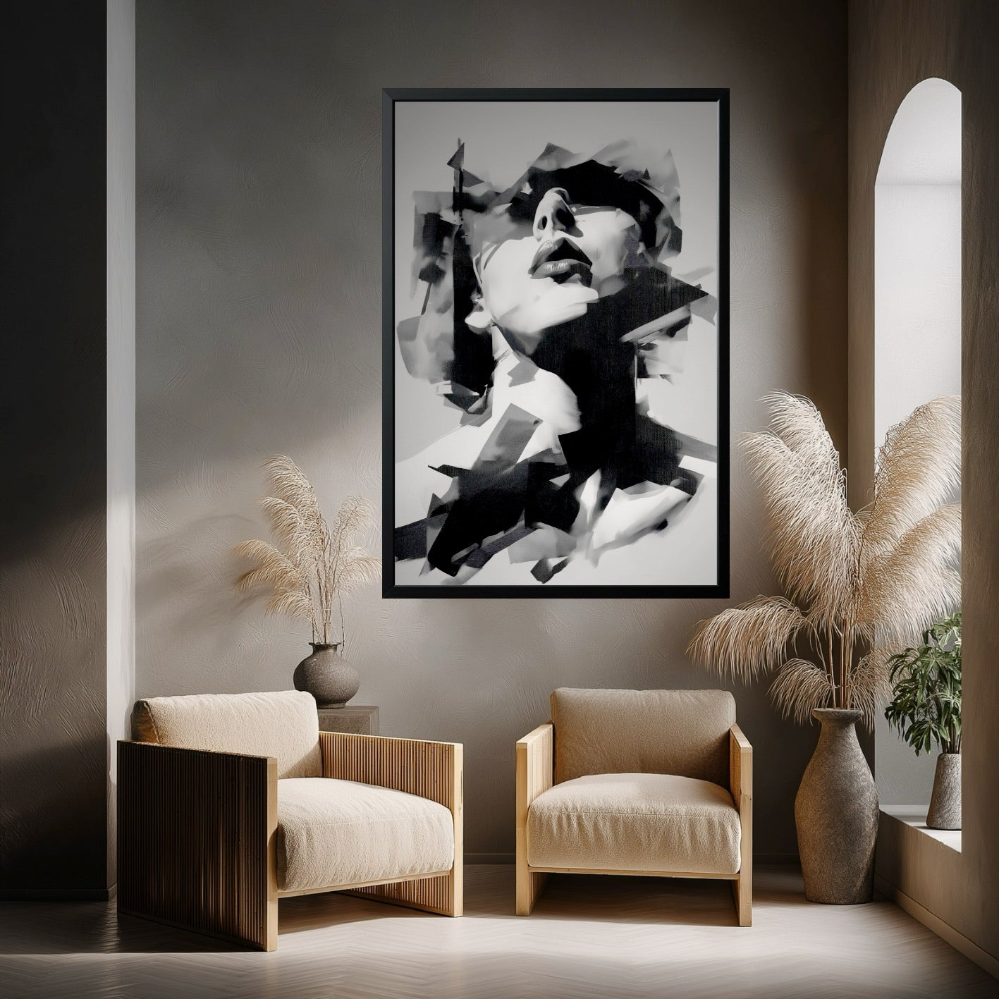 Large abstract portrait in a wabi-sabi style room with two beige armchairs and tall pampas grass in vases.