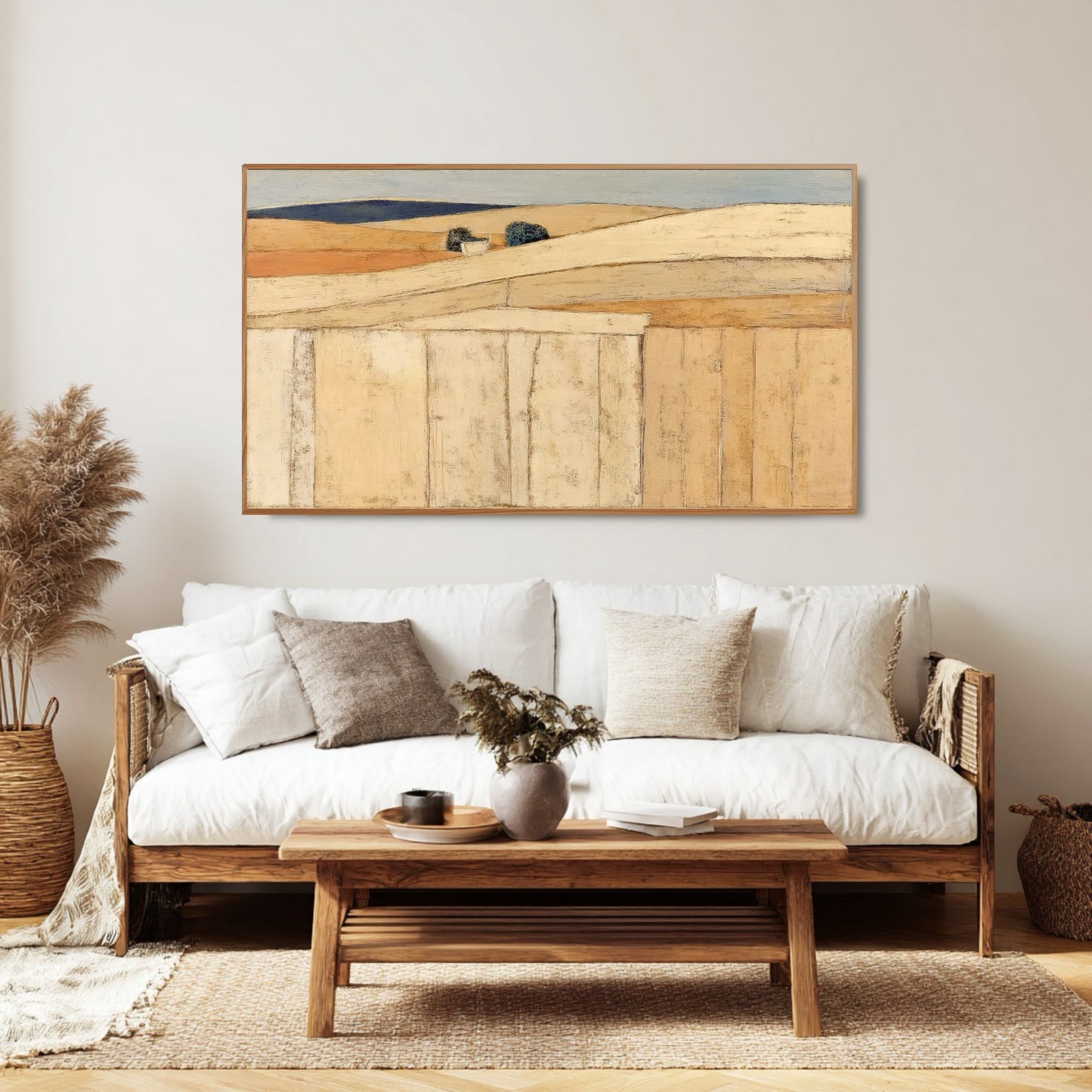 Large-scale abstract art perfectly balances the height above the textured, gray sectional sofa in a bright, modern living room space.