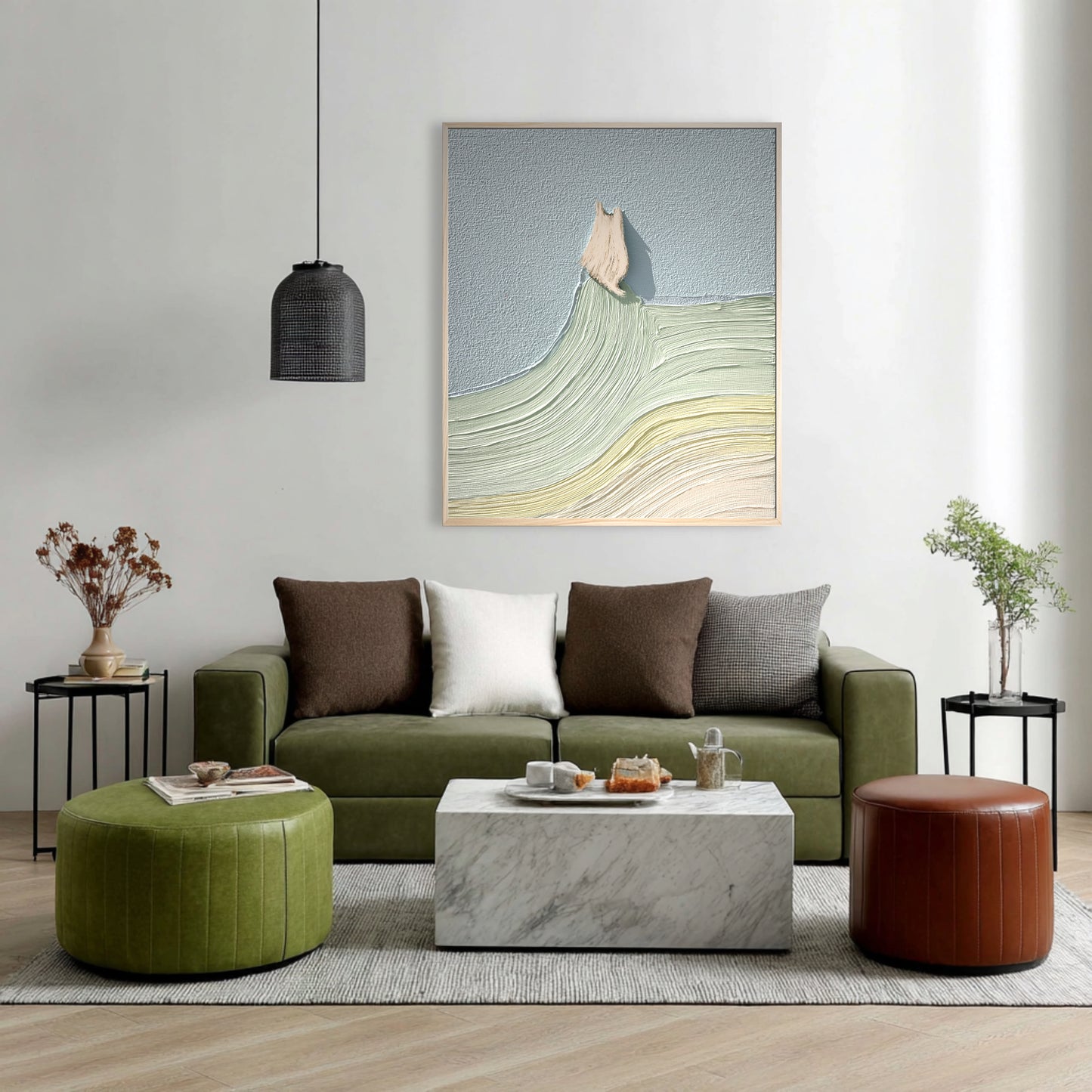 Vertical abstract cat art uses cool tones to balance the earth tones of the olive green sofa and leather ottomans in this contemporary room.