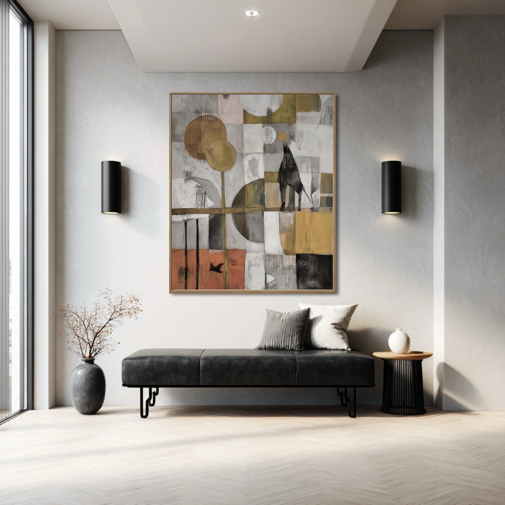 Abstract figural art contrasts beautifully with the black accent wall sconces and minimalist dark leather seating in the entryway.