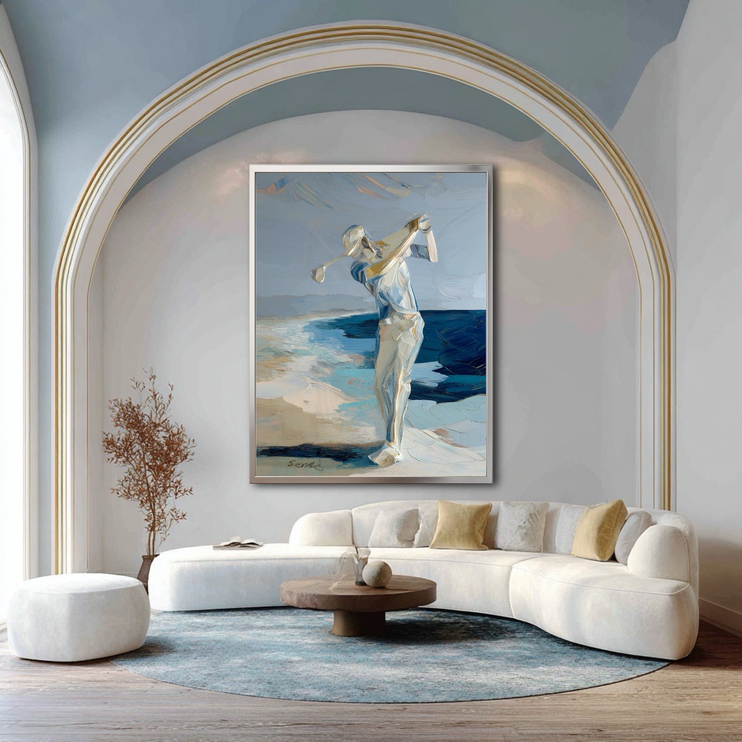 Large golf canvas in luxury living room. Blue coastal tones complement the white curved sofa and arch for a sophisticated look.