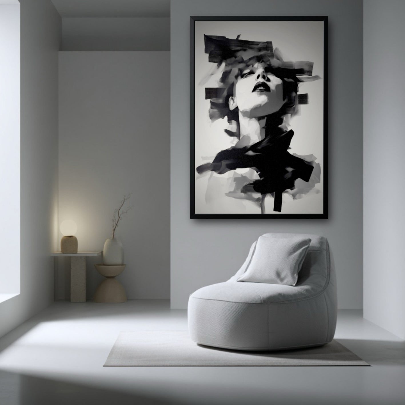 Large framed abstract portrait in a stark, minimalist white room with a single round, soft lounge chair.