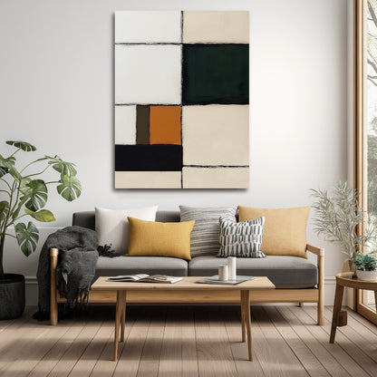 Original art over a grey sofa, integrating yellow accents and light wood in a contemporary living room setting.