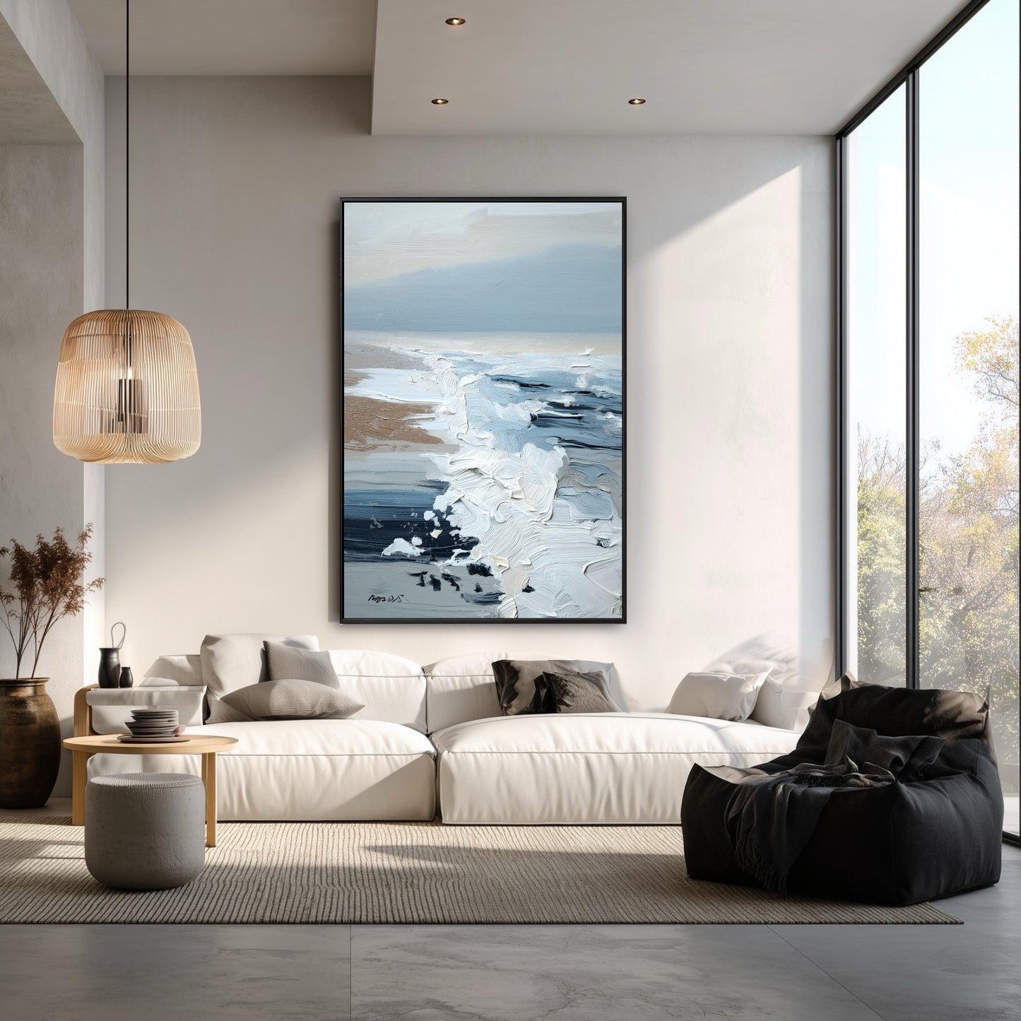 The tall, vertical seascape painting enhances the high ceiling, adding an organic, calming vibe to this modern, large-windowed room.